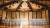 Picture of a unique wedding ceremony in the Compass room with romantic lighting and stars on the floor