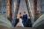 Picture of the bride and groom walking over the bridge at Salford Quays